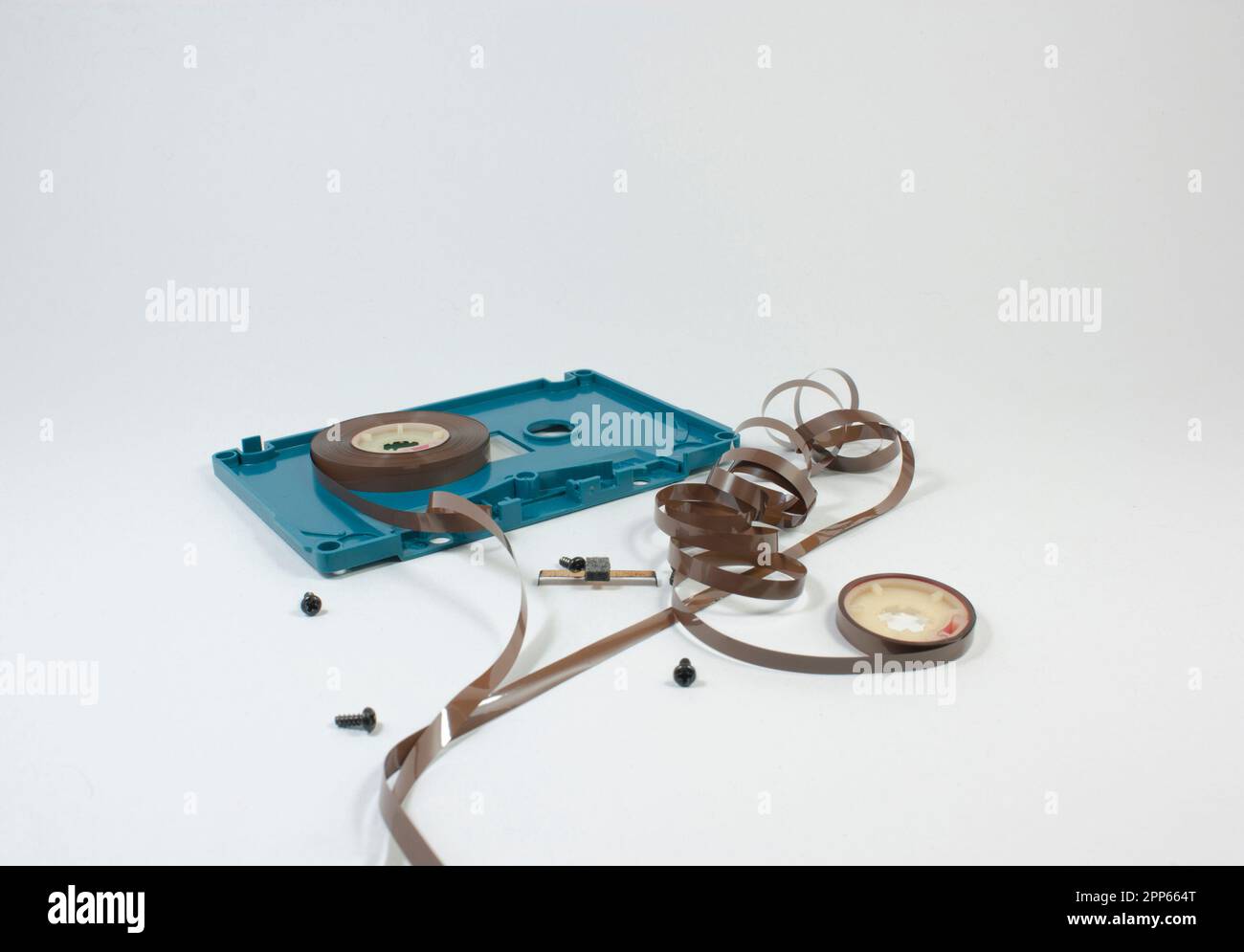 parts of cassette tape on white background Stock Photo Alamy
