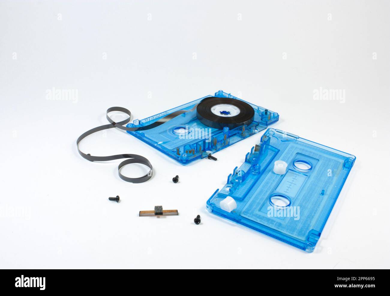 parts of cassette tape on white background Stock Photo - Alamy