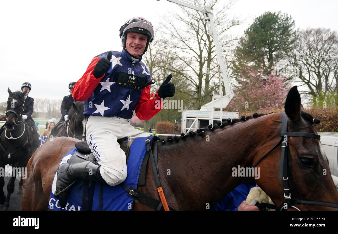 Jockey Jack Tudor celebrates after riding Kitty's Light to victory in ...