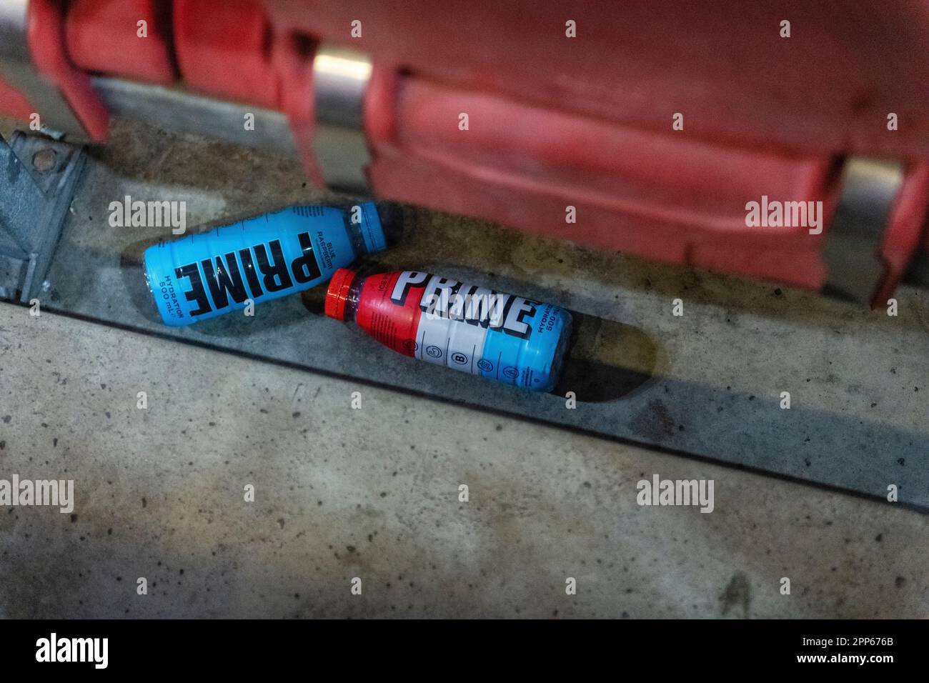 Empty prime bottles on the floor at stadium Stock Photo Alamy