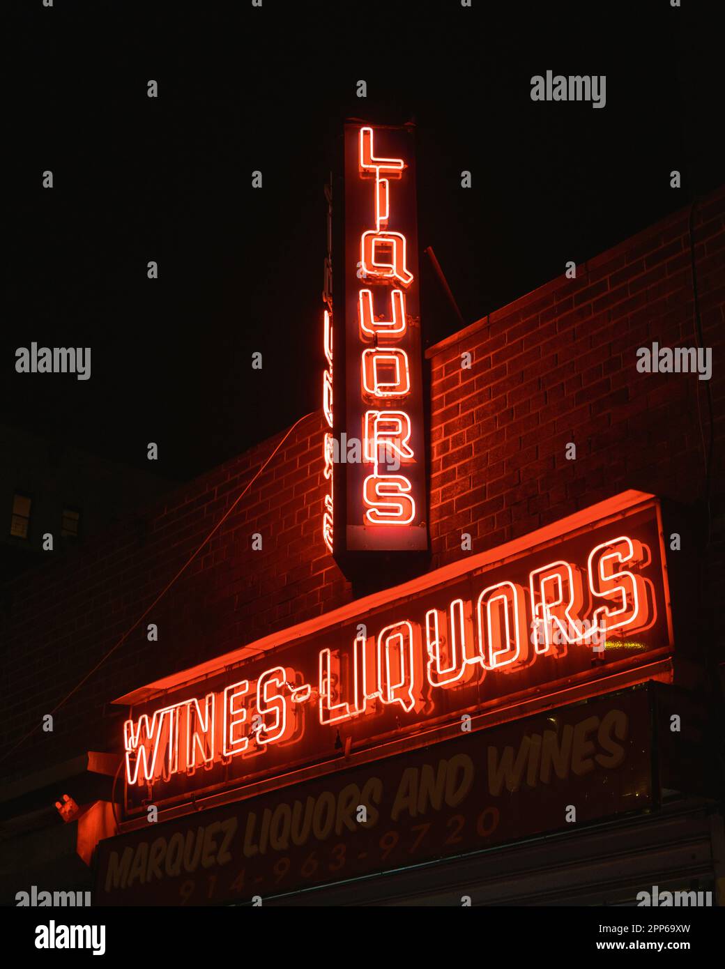 Marquez Liquors & Wines vintage neon sign at night, Yonkers, New York Stock Photo Alamy
