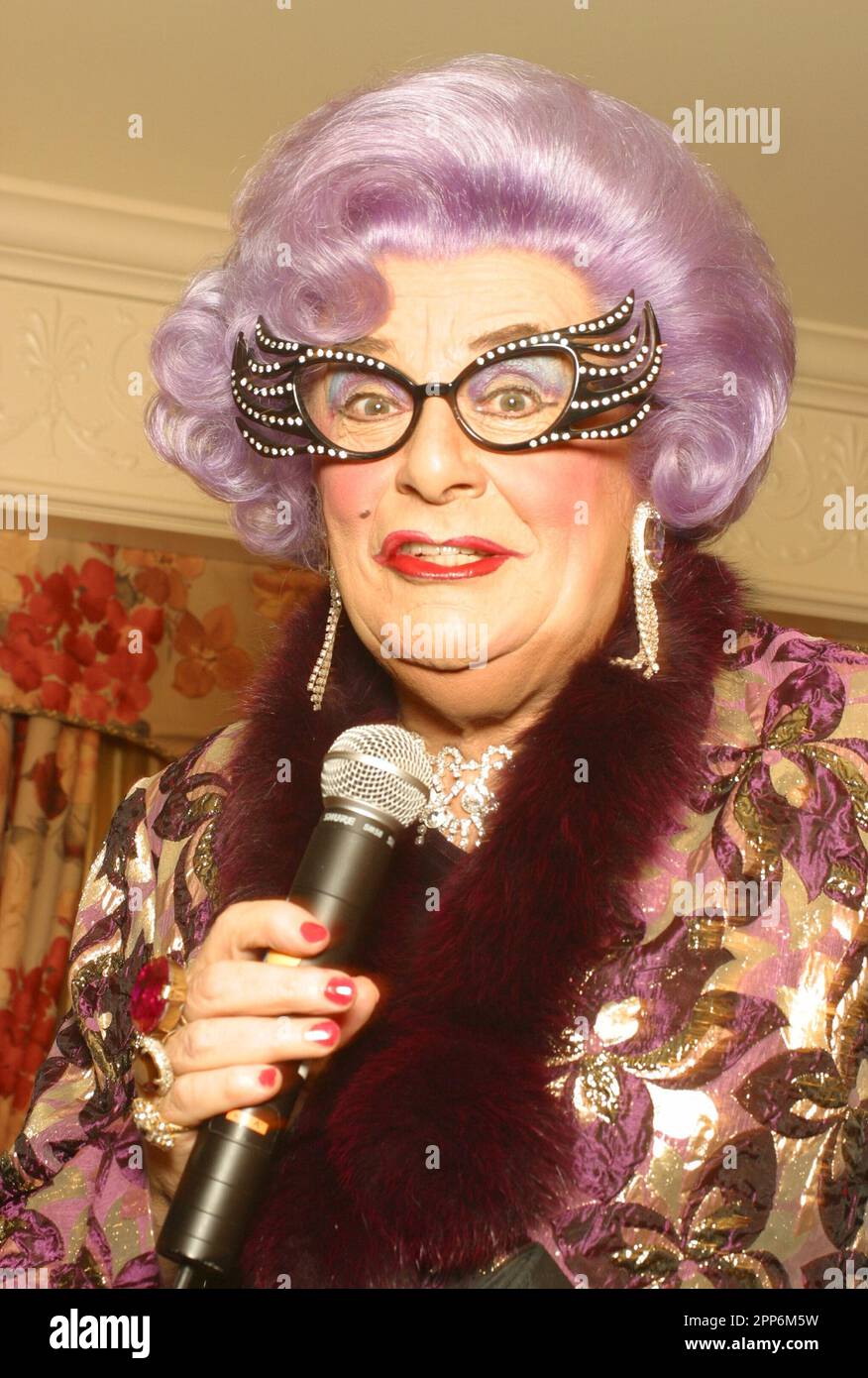 **FILE PHOTO** Dame Edna Has Passed Away. Dame Edna (Barry Humphries) photographed in Philadelphia, PA. February 4, 2003. Credit: Scott Weiner/MediaPunch Stock Photo
