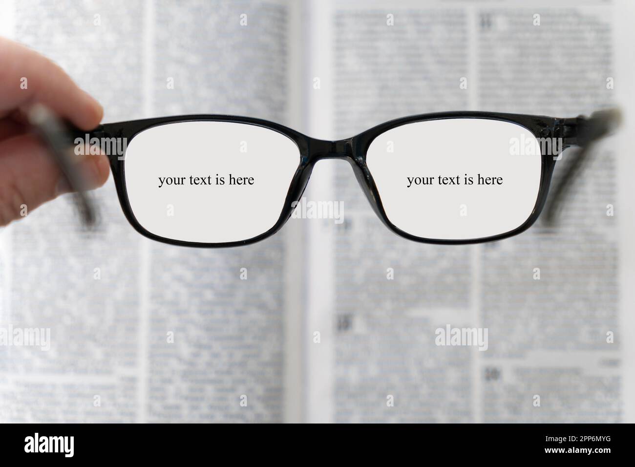 book and eye glasses for read and write over blurred background with