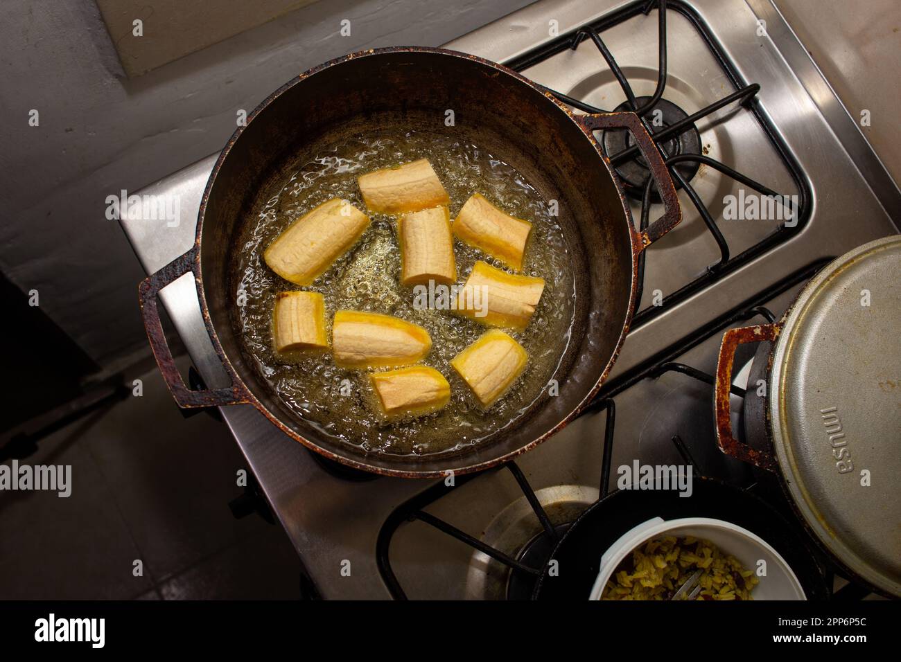 fry plantains with oil in a pan Stock Photo Alamy