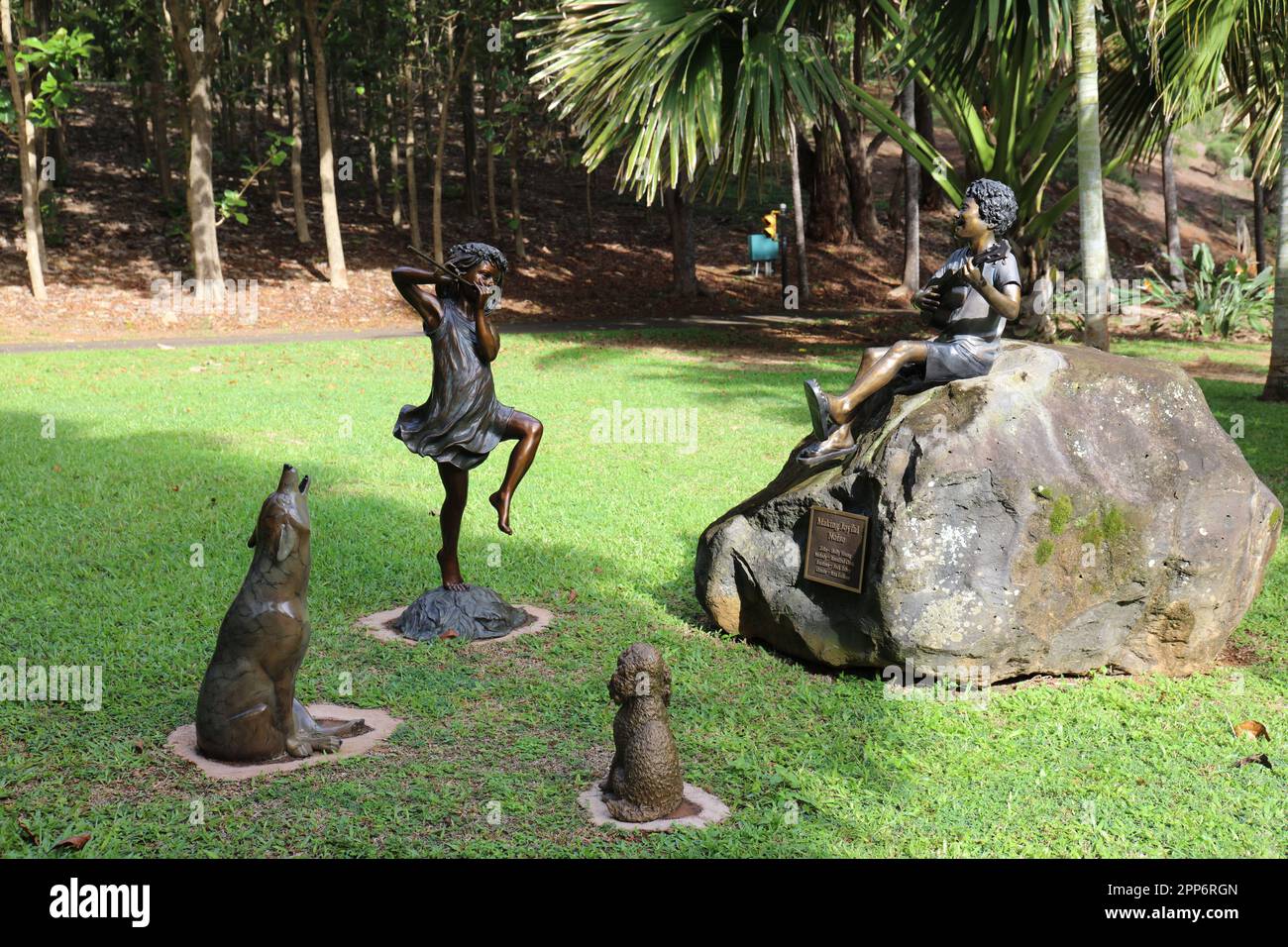 Making Joyful Noise bronze statues of a girl and boy playing