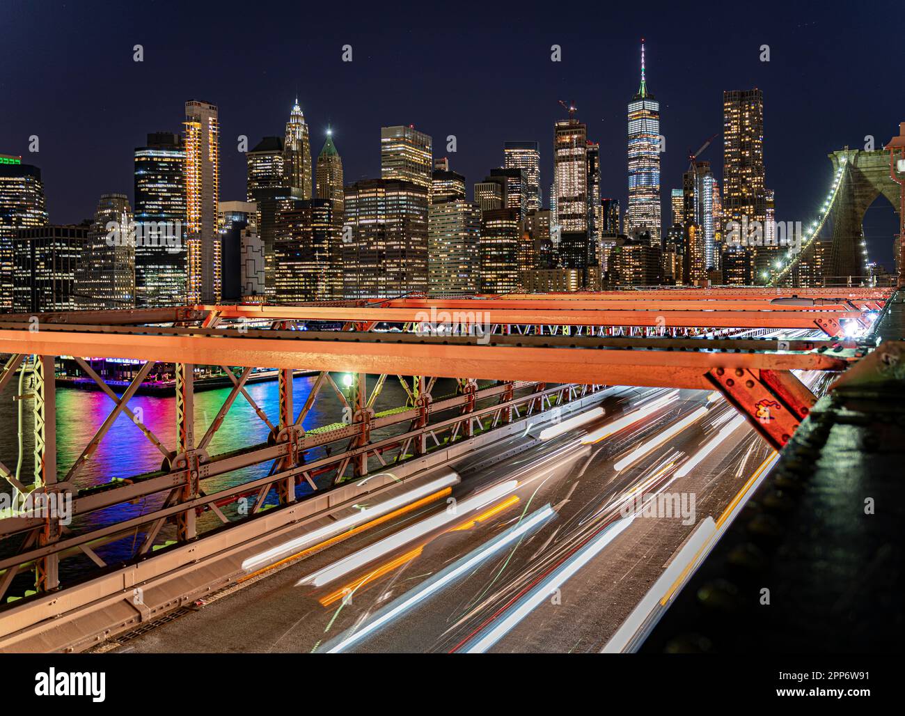 Brooklyn Bridge with car and skyline in the background Stock Photo