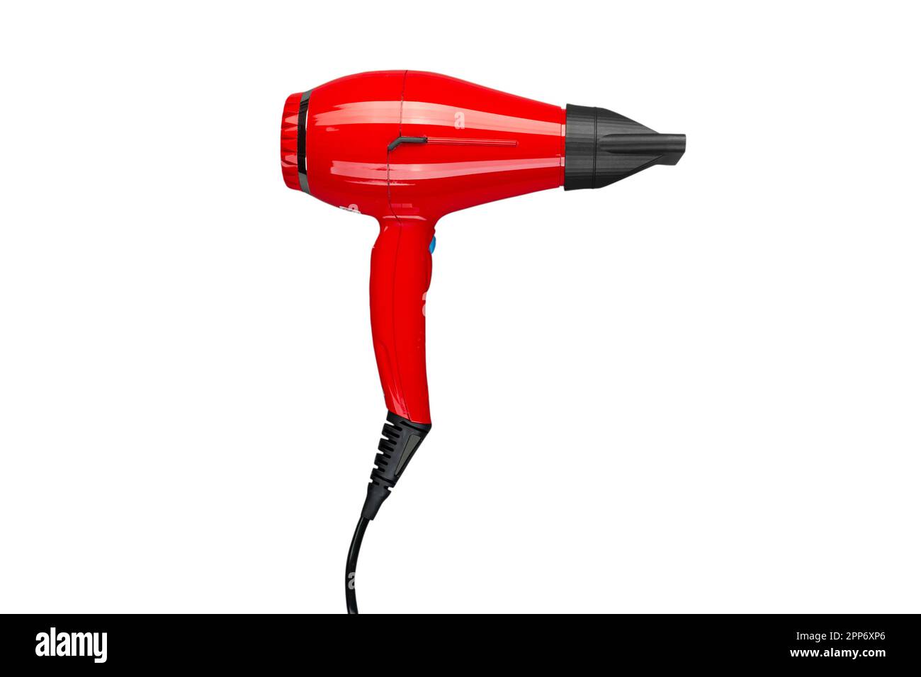 Professional red hair dryer with nozzle. Salon business tool. Isolated on white background. File contains clipping path Stock Photo
