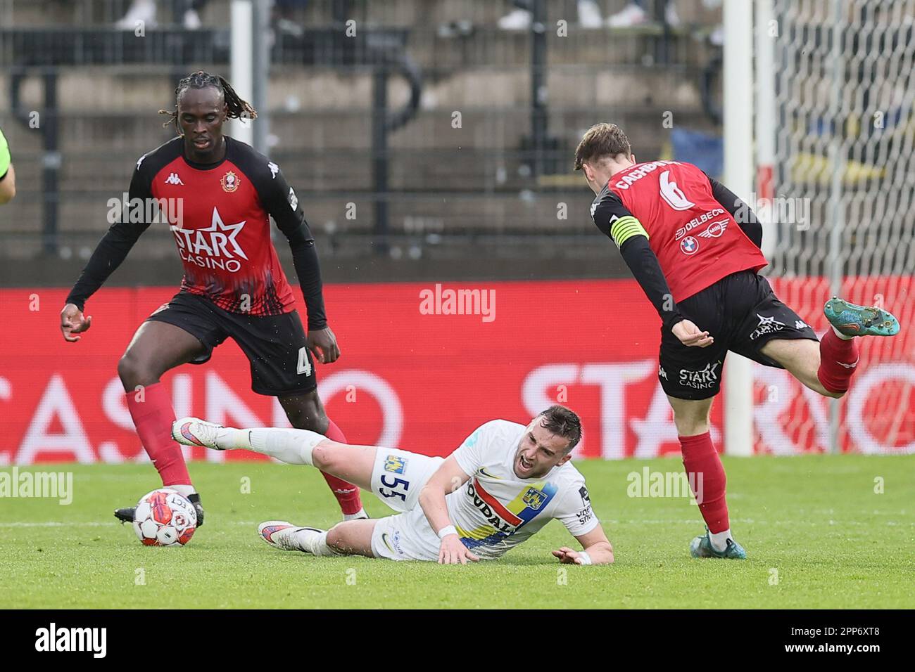 Seraing, Belgium. 22nd Apr, 2023. Seraing's Marvin Silver Tshibuabua, Westerlo's Tuur Dierckx and Seraing's Mathieu Cachbach fight for the ball during a soccer match between RFC Seraing and KVC Westerlo, Saturday 22 April 2023 in Seraing, on day 34 of the 2022-2023 'Jupiler Pro League' first division of the Belgian championship. BELGA PHOTO BRUNO FAHY Credit: Belga News Agency/Alamy Live News Stock Photo