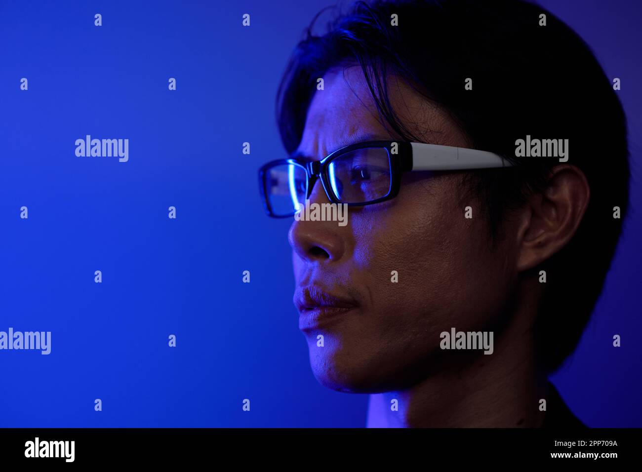 Man glasses serious standing hi-res stock photography and images - Alamy