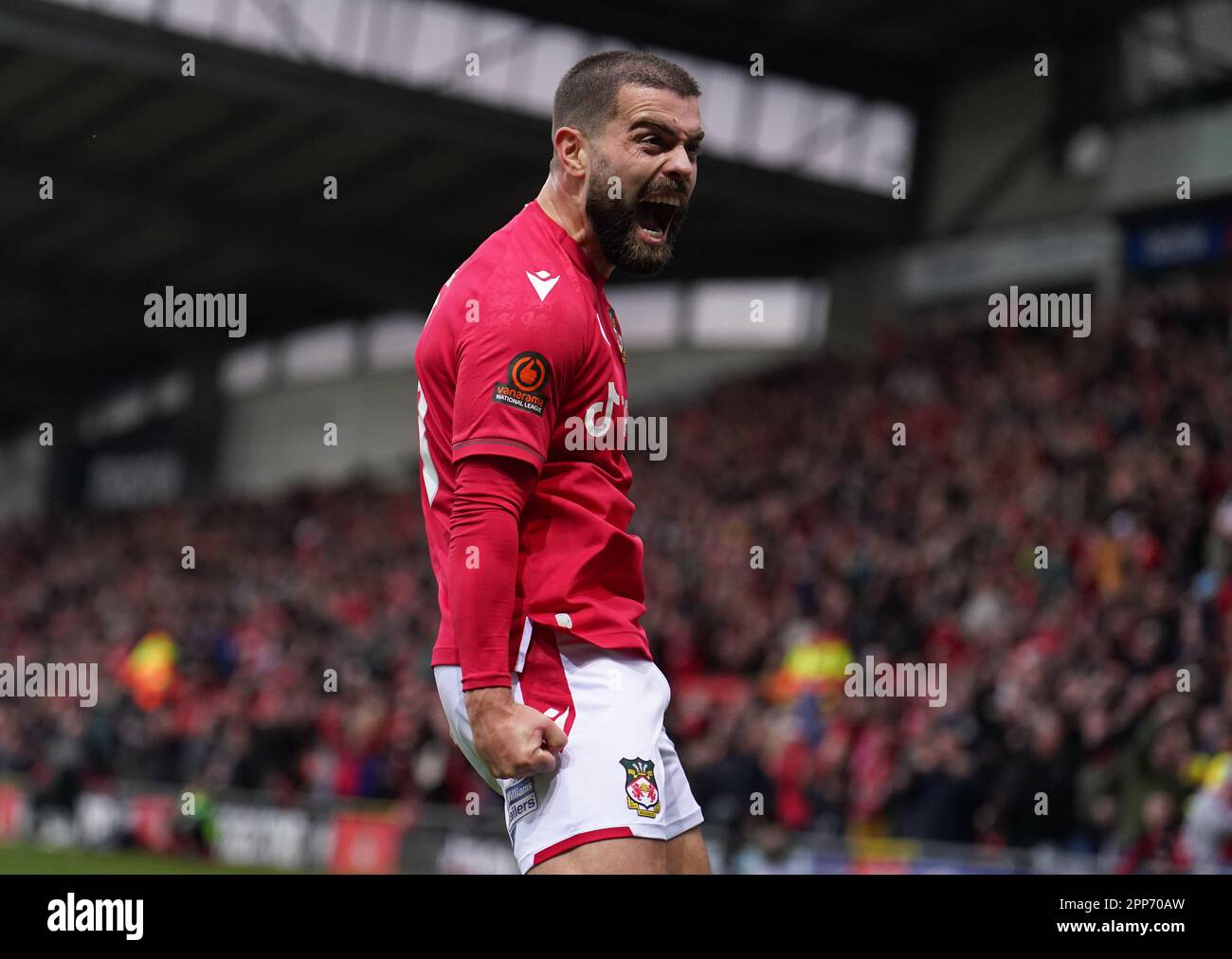 Wrexham's Elliott Lee celebrates scoring their side's first goal of the ...