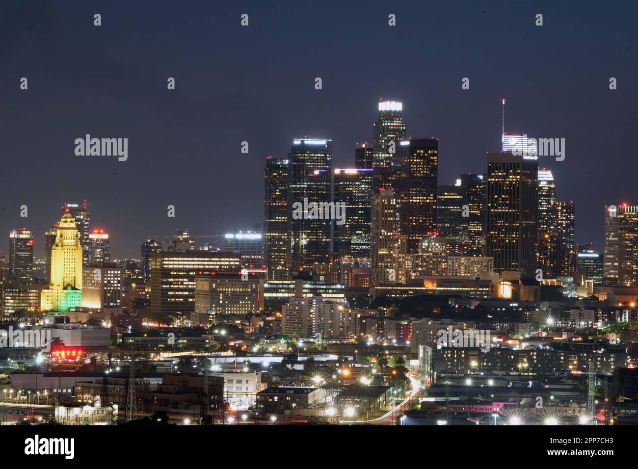 City Hall is illuminated in the colors of the California flag in honor ...