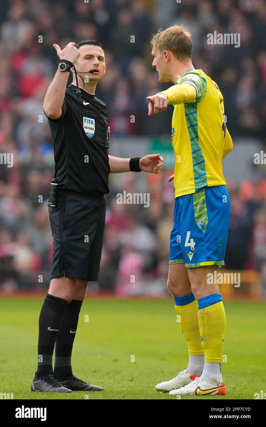 Joe Worrall 4 of Nottingham Forest argues with Referee Michael Oliver  during the Premier League match Liverpool vs Nottingham Forest at Anfield,  Liverpool, United Kingdom, 22nd April 2023 (Photo by Steve FlynnNews