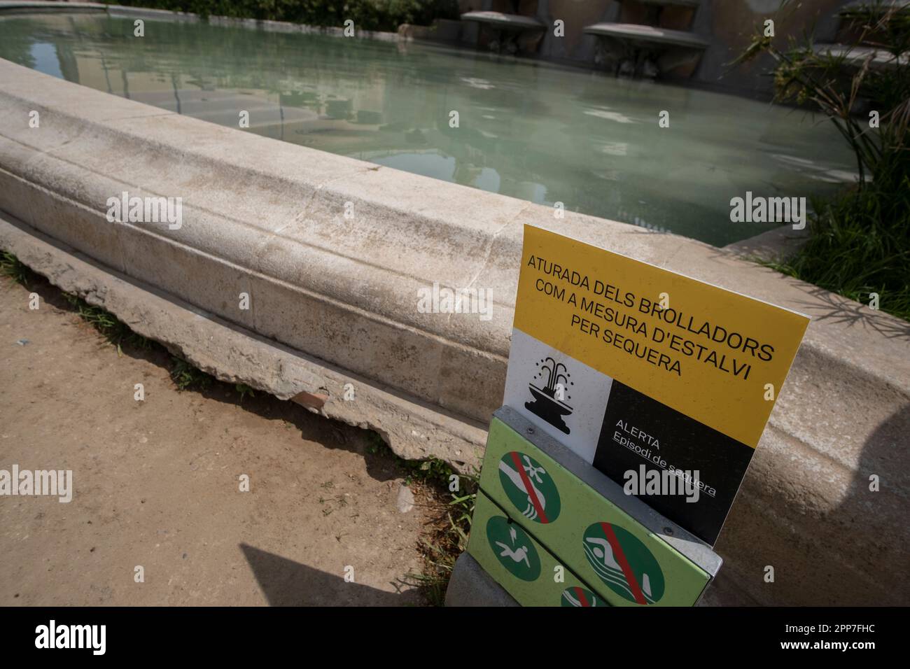 Barcelona, Spain. 22nd Apr, 2023. An informative poster about the stop of the pumps as a measure to save water due to drought is seen in La Fuente Mágica in Plaça Josep Puig i Cadafalch in Barcelona. After 30 months without rain in Catalonia and with water reserves at historic lows, the Government of Catalonia has been forced to take water-saving measures by closing the fountains at La Fuente Mágica in Plaça de Josep Puig i Cadafalch which constitutes in itself a great tourist spectacle of water, light and sound. (Photo by Paco Freire/SOPA Images/Sipa USA) Credit: Sipa USA/Alamy Live News Stock Photo