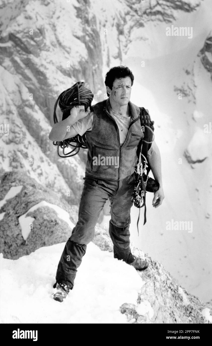 SYLVESTER STALLONE in CLIFFHANGER 1993 director RENNY HARLIN music Trevor Jones costume design Ellen Mirojnick Carolco Pictures / Canal + / Pioneer / RCS Video / Cliffhanger Productions / Columbia Tristar Films Stock Photo