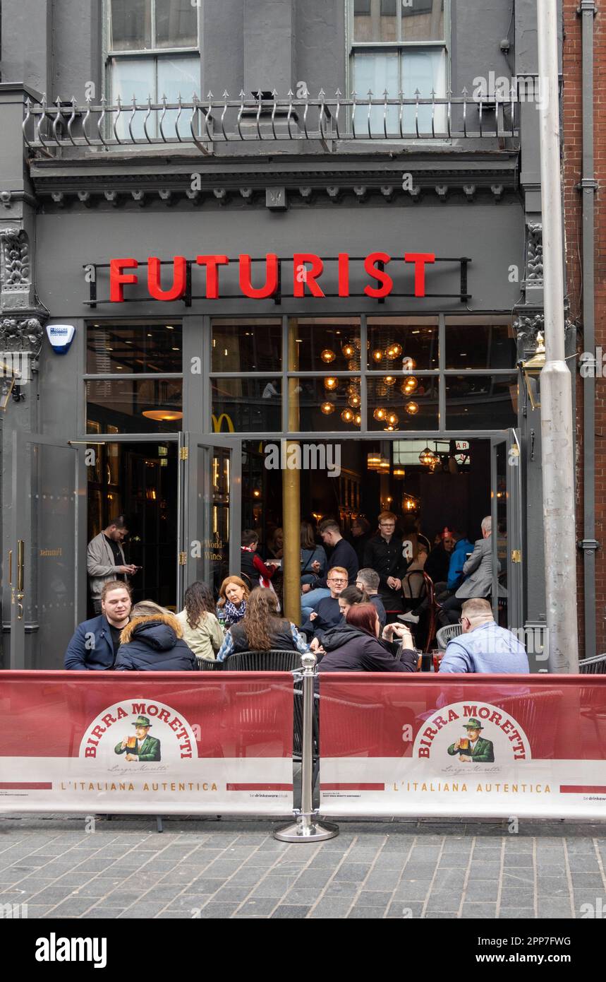 Customer enjoying drinks alfresco at Futurist, a modern pub in Liverpool Stock Photo
