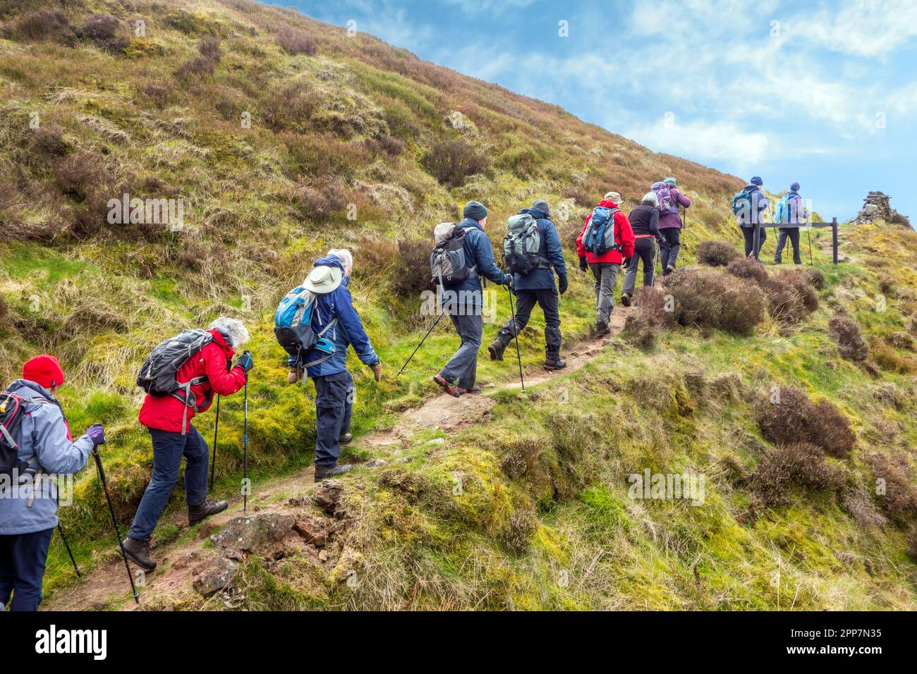 Members of the Sandbach U3A long walking group enjoying rambling in the Peak District hills above the Derbyshire town of Buxton England Stock Photo