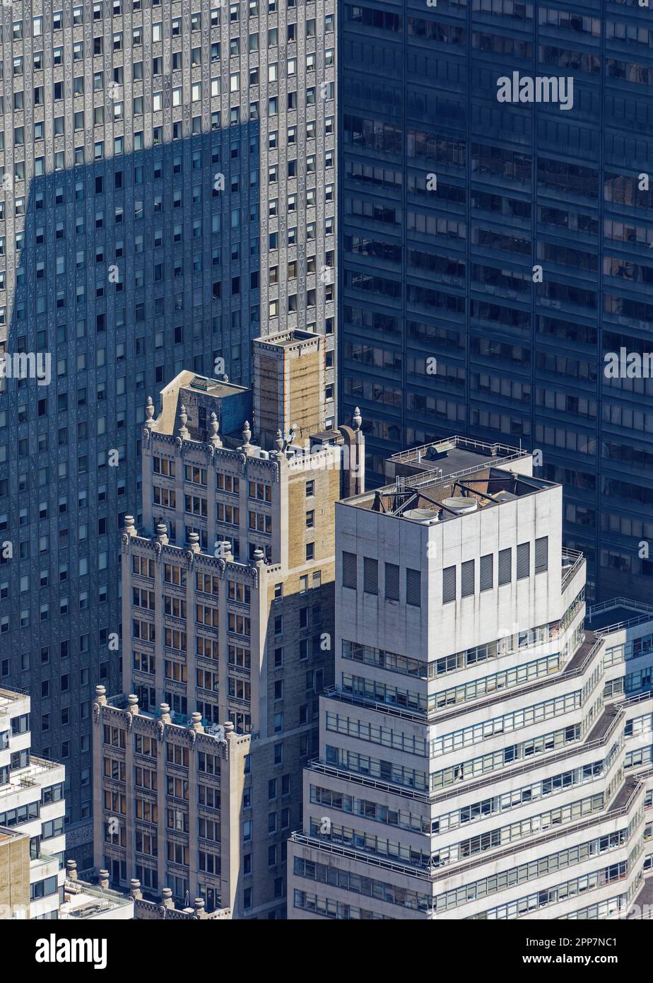 Style contrast: 369 (left) and 355 Lexington Avenue, a pair of brick high-rise office buildings, built 32 years apart in NYC’s Murray Hill section. Stock Photo