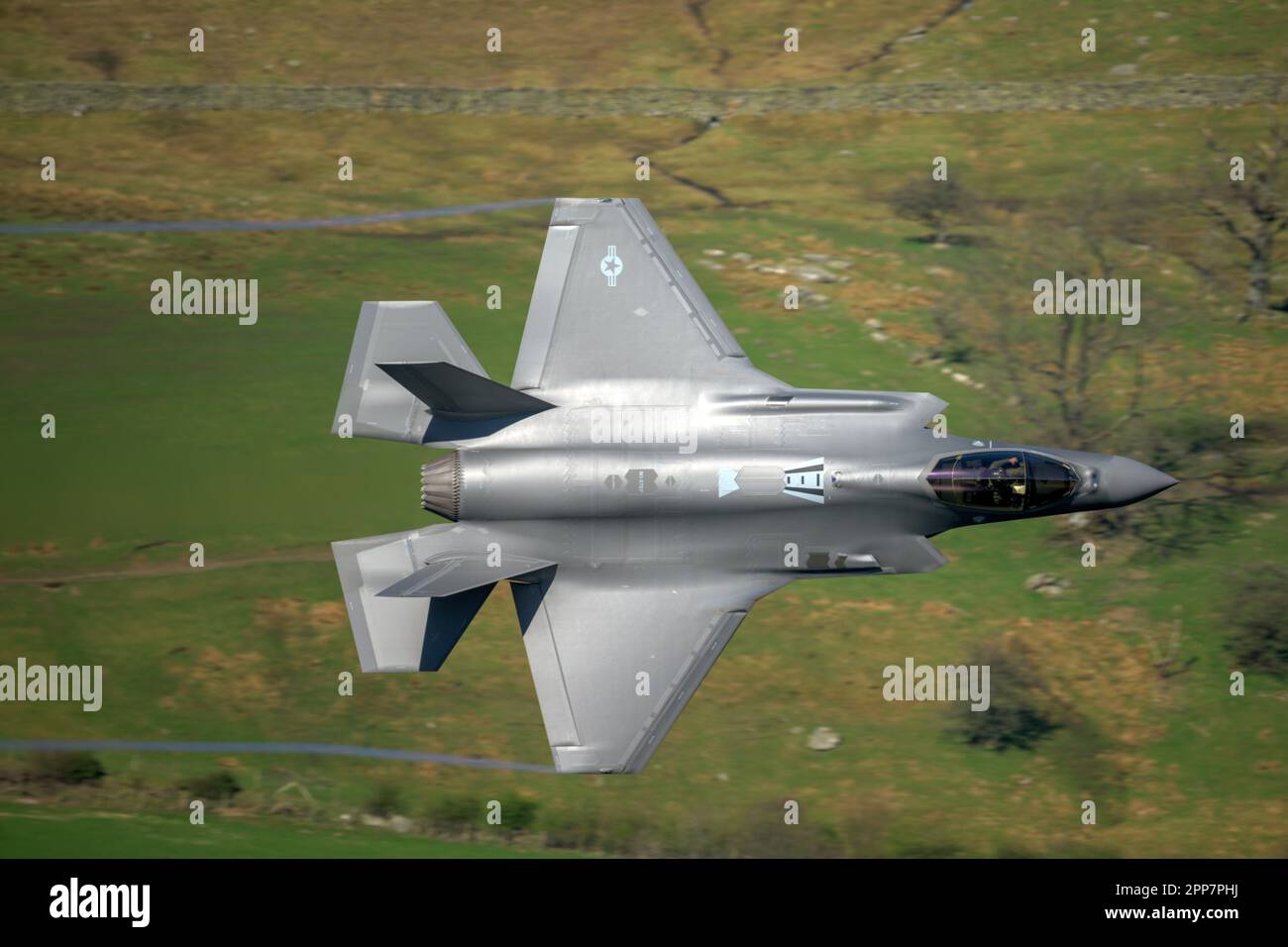 USAF F-35A Lightning II 'Valor' flight from RAF Lakenheath 495th Valkyries squadron operating low level in the Lake District at Ullswater Stock Photo