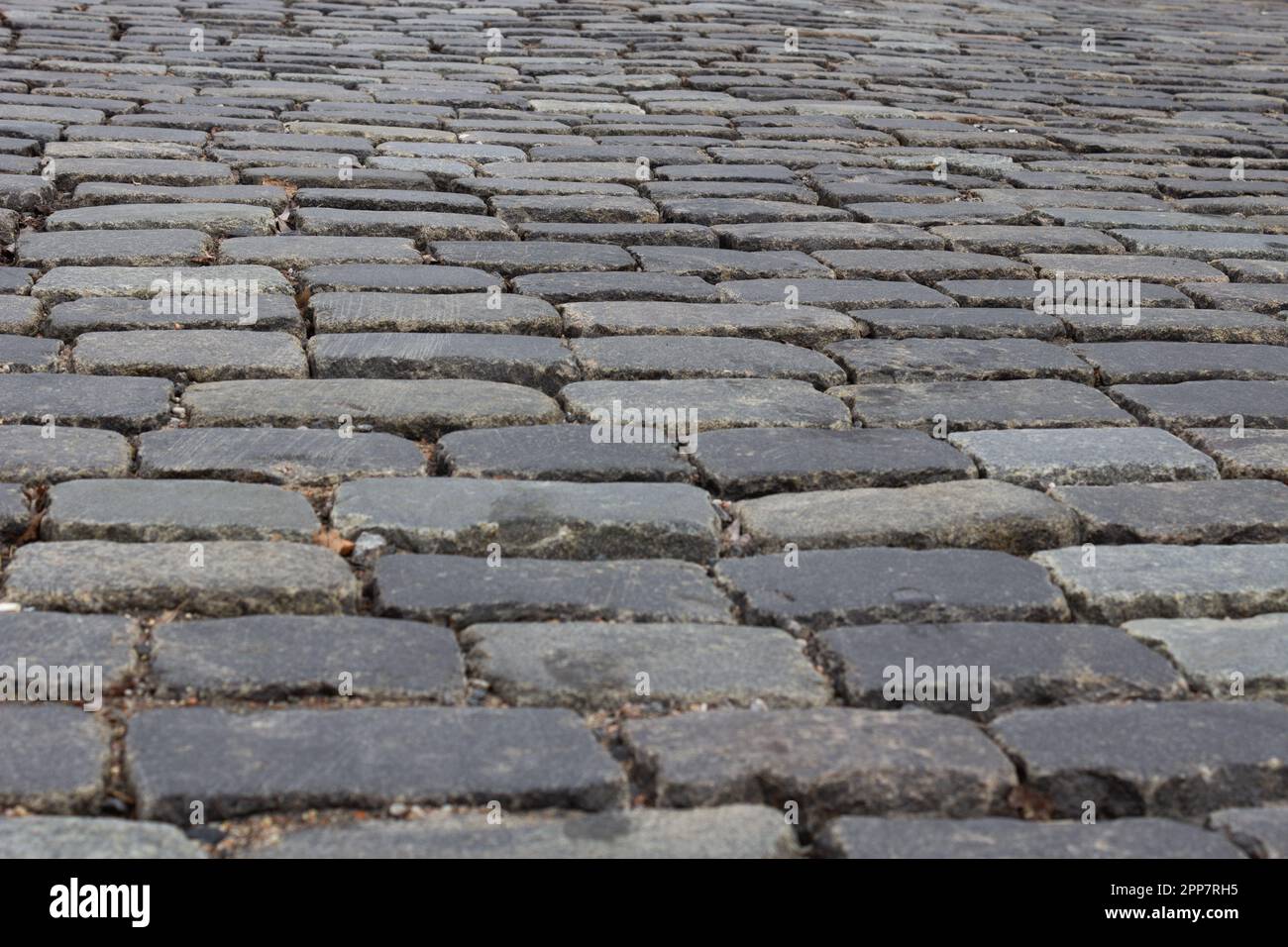 Stone road in city hi-res stock photography and images - Alamy