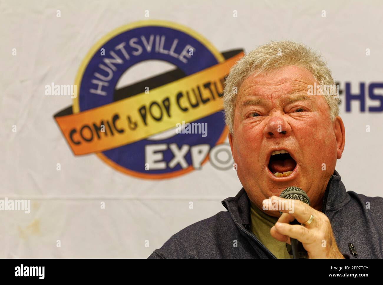 Huntsville, Alabama, USA. 22 Apr 2023. Star Trek actor William Shatner screams "Khaaan!" like he famously did in the 1982 film Star Trek II: The Wrath of Khan in response to an audience member's request on the second day of the 2023 Huntsville Comic & Pop Culture Expo on Saturday, April 22, 2023 at the Von Braun Center in Huntsville, Madison County, AL, USA. The Canadian actor and author, 92, is perhaps best known for his portrayal of Capt. James Tiberius Kirk in the original Star Trek television series and subsequent movies. (Credit: Billy Suratt/Apex MediaWire via Alamy Live News) Stock Photo
