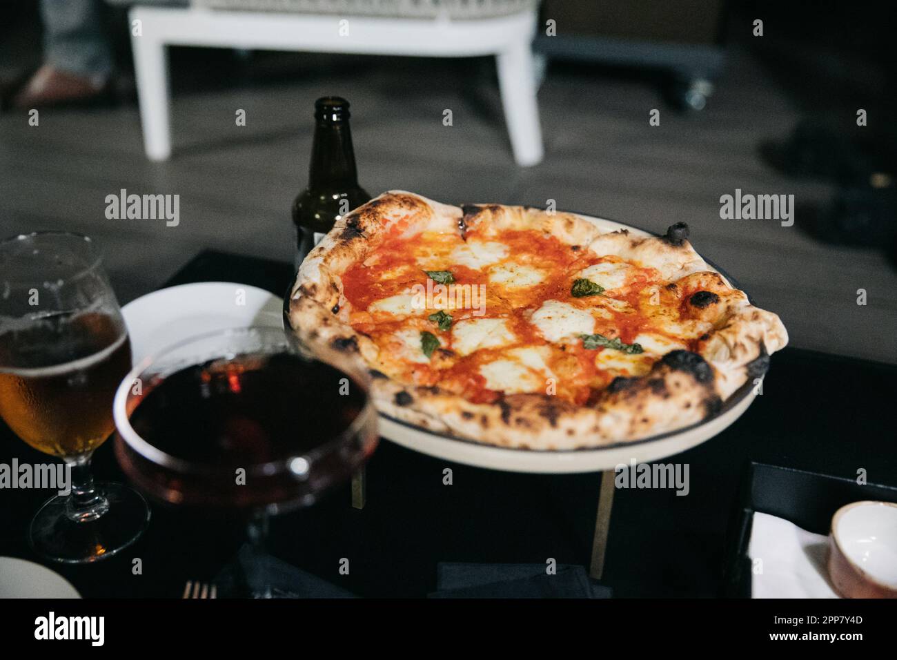 Delicious close up of a Margherita Pizza in Rome, Italy at a restaurant at  night Stock Photo - Alamy