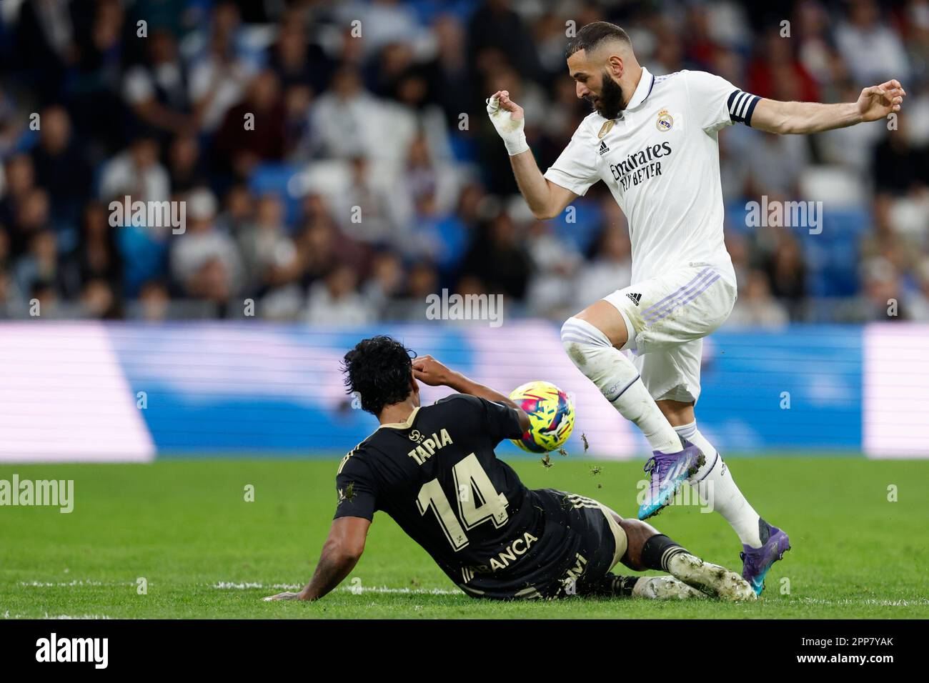 Madrid, Spain. 22nd Apr, 2023. Karim Benzema of Real Madrid CF and Renato Tapia of RC Celta de Vigo during the La Liga match between Real Madrid and RC Celta played at Santiago Bernabeu Stadium on April 22, 2023 in Madrid, Spain. (Photo by Cesar Cebolla/PRESSIN) Credit: PRESSINPHOTO SPORTS AGENCY/Alamy Live News Stock Photo