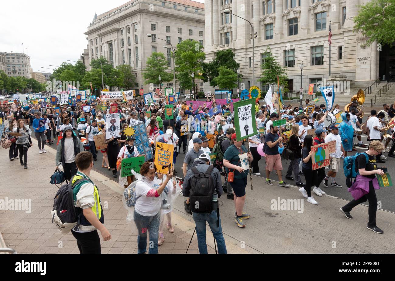 Apr. 22, 2013. Earth Day maarch. After rallying at Freedom Plaza, several hundred chanting marchers head to the White House to demand President Biden do more to end the reliance on climate-destorying fossil fuels. Stock Photo