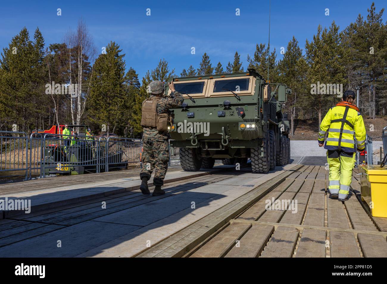 U.S. Marines with 2d Combat Engineer Battalion, 2d Marine Division, park a Logistic Vehicle System Replacement on a ferry during ferry crossing operations near Sveg, Sweden, April 18, 2023. Marines are deployed to Norway as part of Marine Rotational Forces Europe 23.1 which focuses on regional engagements throughout Europe by conducting various exercises, arctic cold-weather and mountain warfare training, and military-to-military engagements, which enhance overall interoperability of the U.S. Marine Corps with allies and partners. (U.S. Marine Corps photo by Sgt. Christian M. Garcia) Stock Photo