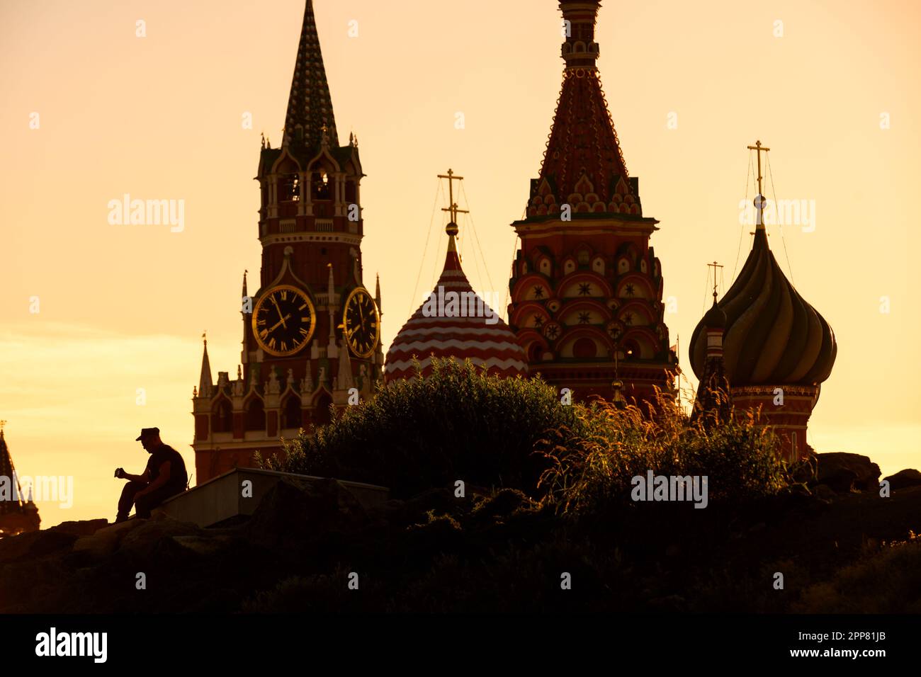 Silhouette of policeman in Zaryadye near Kremlin, Moscow, Russia. Landscaped Zaryadye Park is tourist attraction of Moscow. Scenic view of city landma Stock Photo