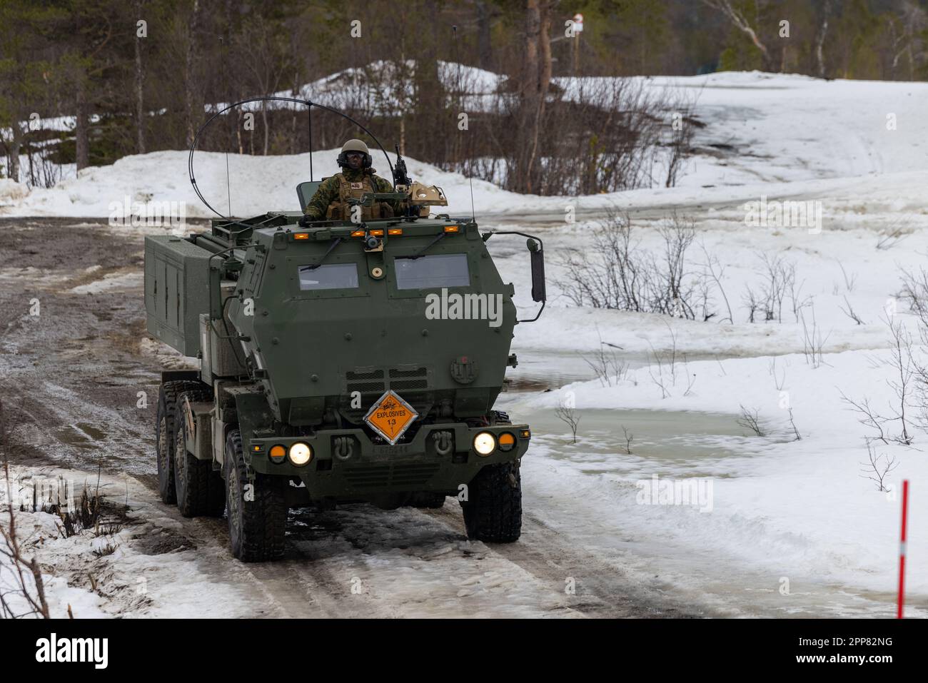 U.S Marines with Hotel Battery, 2nd Battalion, 10th Marine Regiment, 2d Marine Division, prepare to fire a M142 High Mobility Artillery Rocket System in Setermoen, Norway April 20, 2023. The HIMARS launcher is a mobile rocket system that provides lethal close and long-range missile fire support to the Artic region. (U.S. Marine Corps photo by Lance Cpl. Eric Dmochowski) Stock Photo