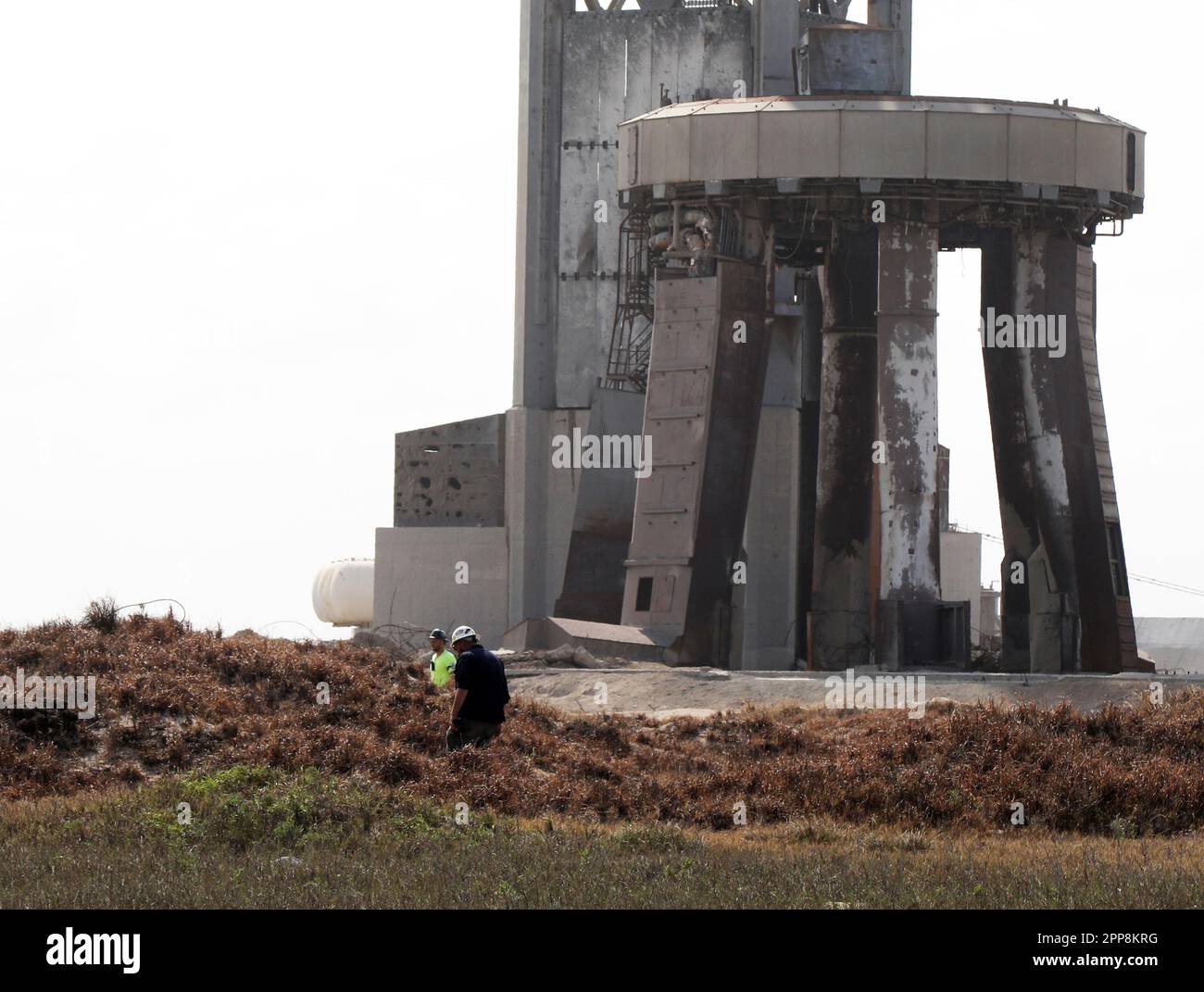 Base Exploding Boca Chica, United States. 22nd Apr, 2023. Workers check out for debris ...