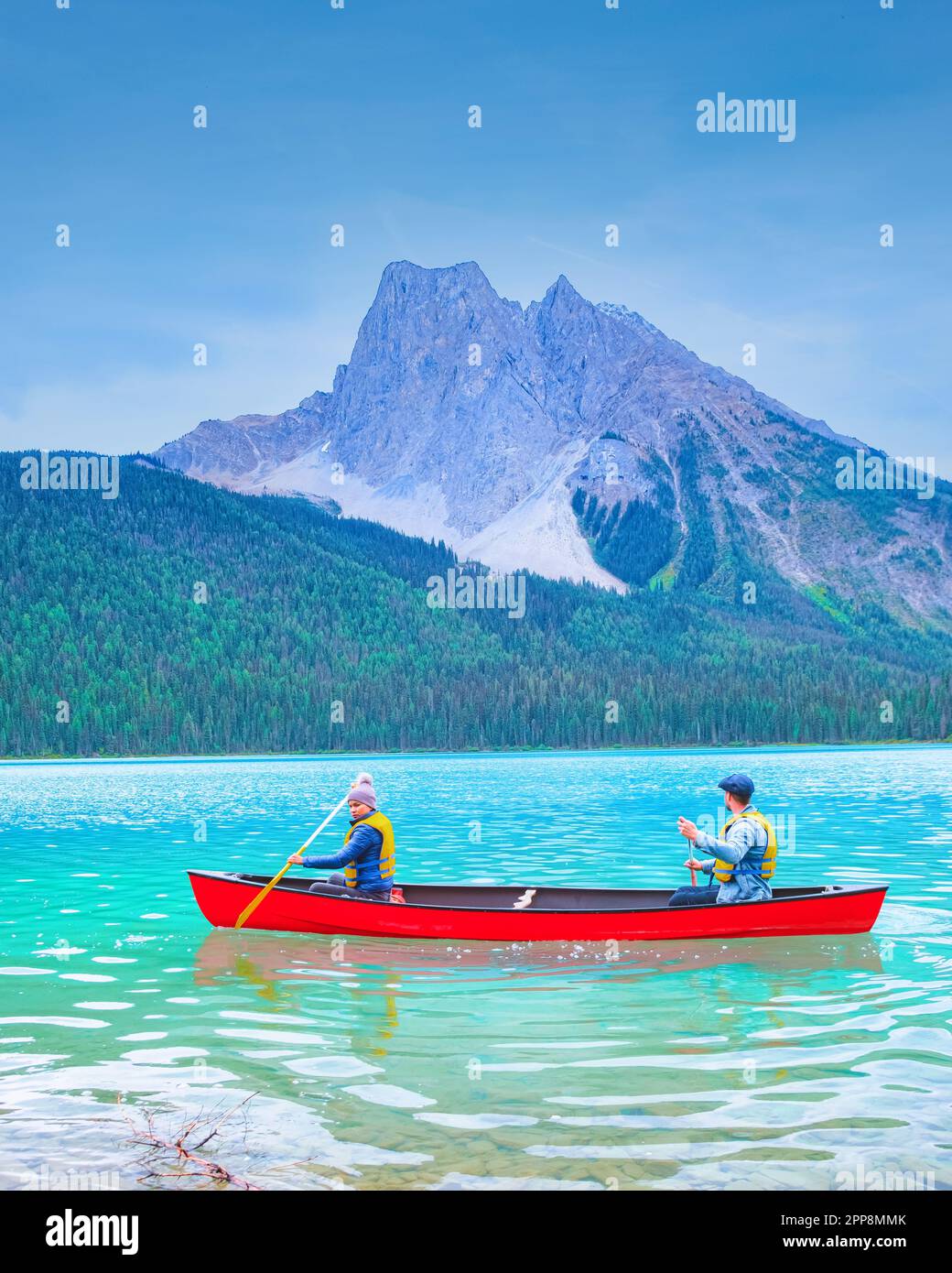 couple in a canoe at the lake, Emerald Lake, Yoho National Park in