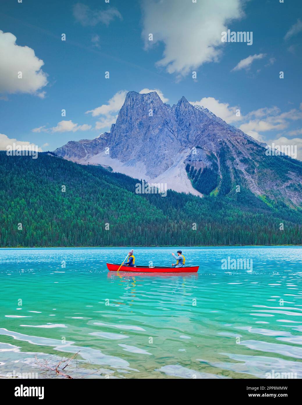 couple in a canoe at the lake, Emerald Lake, Yoho National Park in