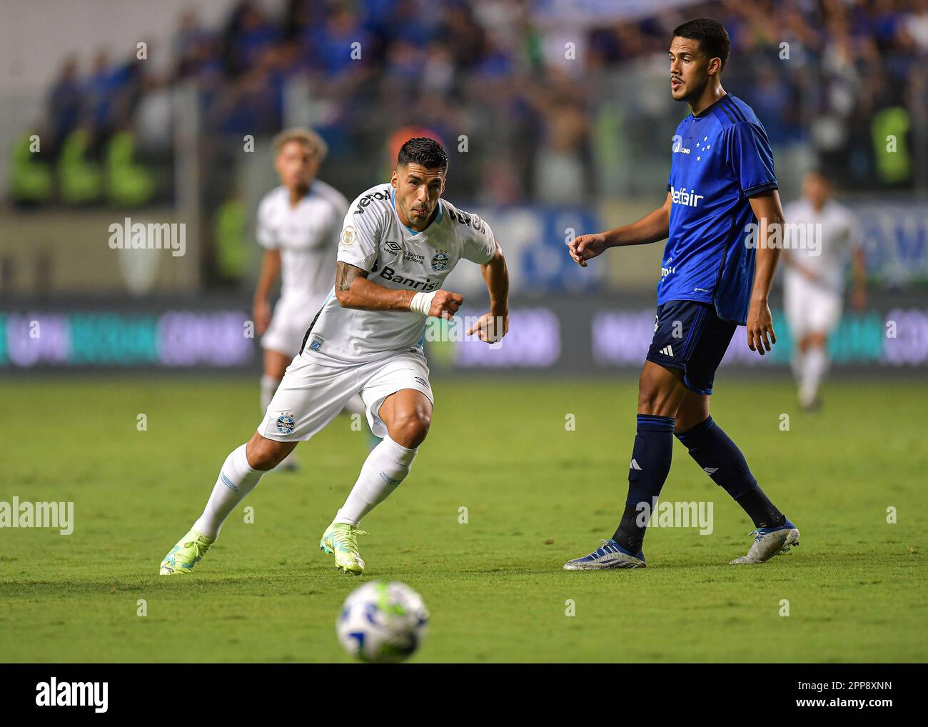 Rafael Navarro of Palmeiras competes for the ball with Claudinho