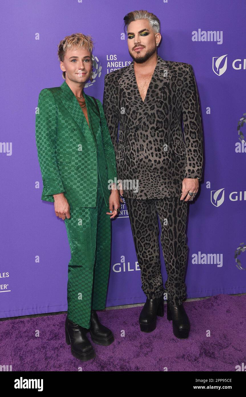 Oliver Gliese, left, and Adam Lambert arrive at the Los Angeles LGBT