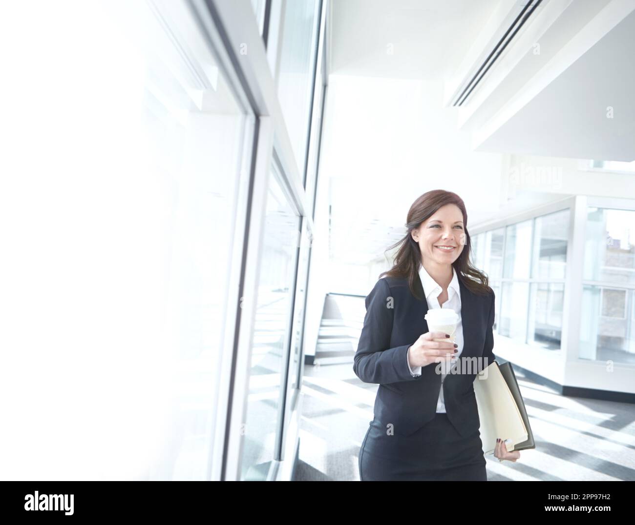 Pretty mature woman walking down hi-res stock photography and images ...