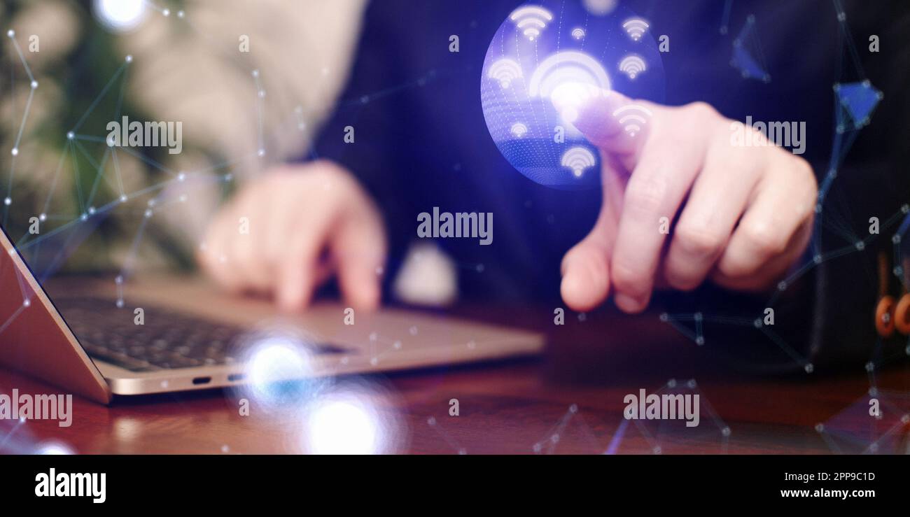 Businessman using laptop with glowing network Stock Photo