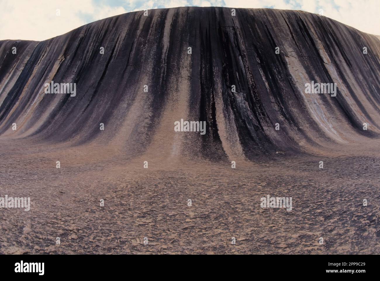 Wave Rock is a natural rock formation that is shaped like a tall ...