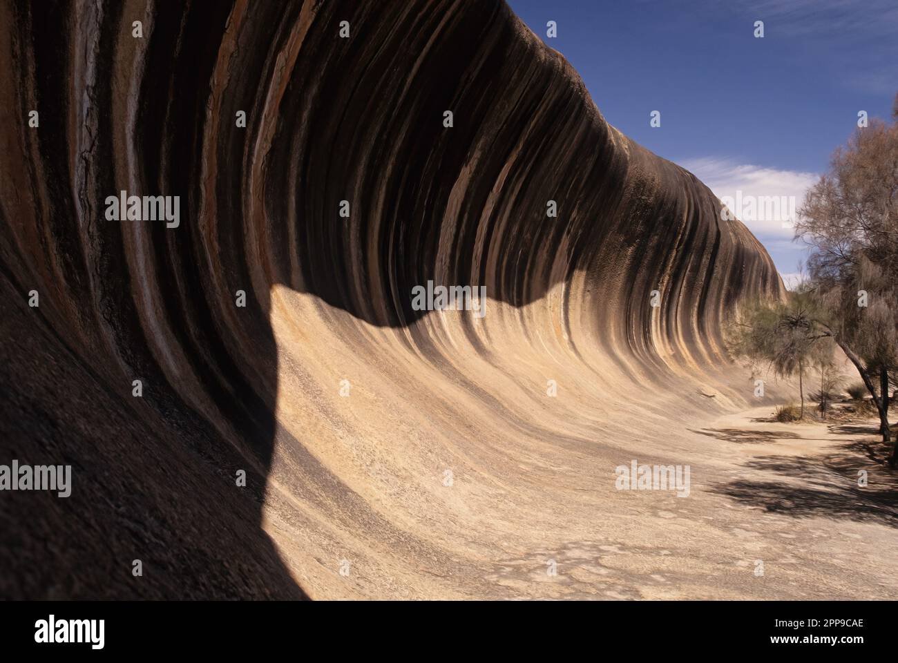 Wave Rock is a natural rock formation that is shaped like a tall ...