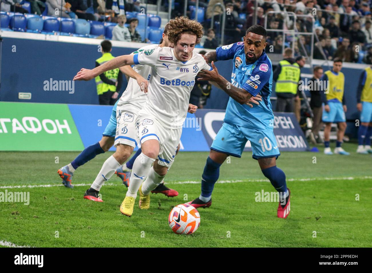 Saint Petersburg, Russia. 22nd Apr, 2023. Luka Gagnidze (No.34) of Dynamo and Malcom Filipe Silva de Oliveira, commonly known as Malcom (No.10) of Zenit in action during the Russian Premier League football match between Zenit Saint Petersburg and Dynamo Moscow at Gazprom Arena. Zenit 3:1 Dynamo. (Photo by Maksim Konstantinov/SOPA Images/Sipa USA) Credit: Sipa USA/Alamy Live News Stock Photo