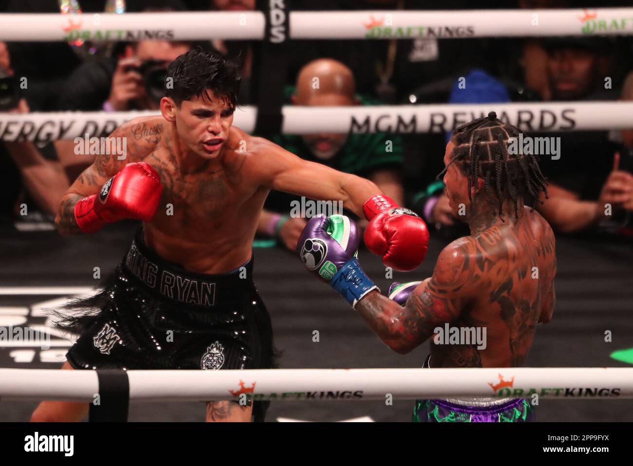 LAS VEGAS, NEVADA April 22 (LR) Ryan Garcia punches Gervonta Davis