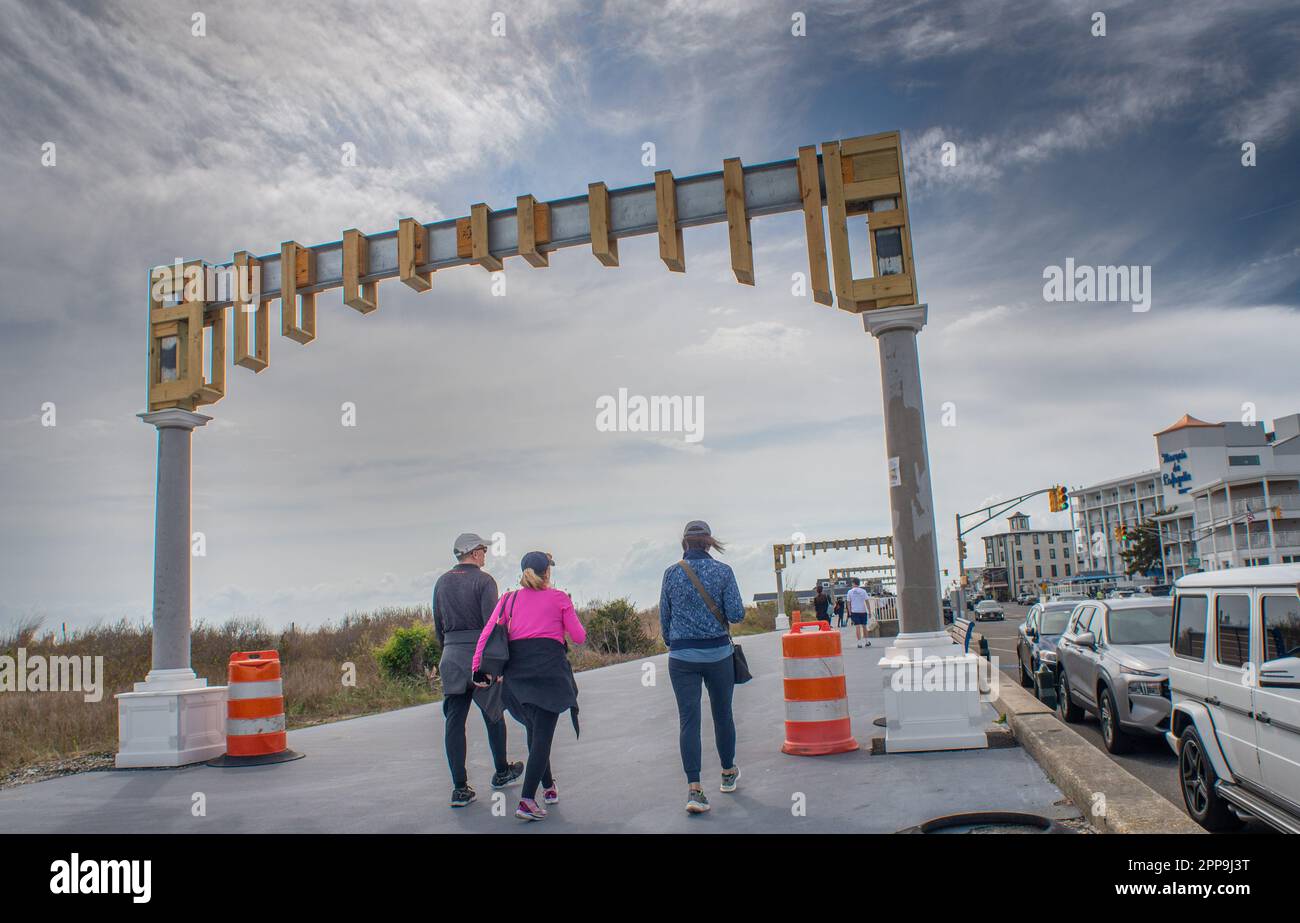Cape May, United States. 22nd Apr, 2023. Pedestrians pass through the
