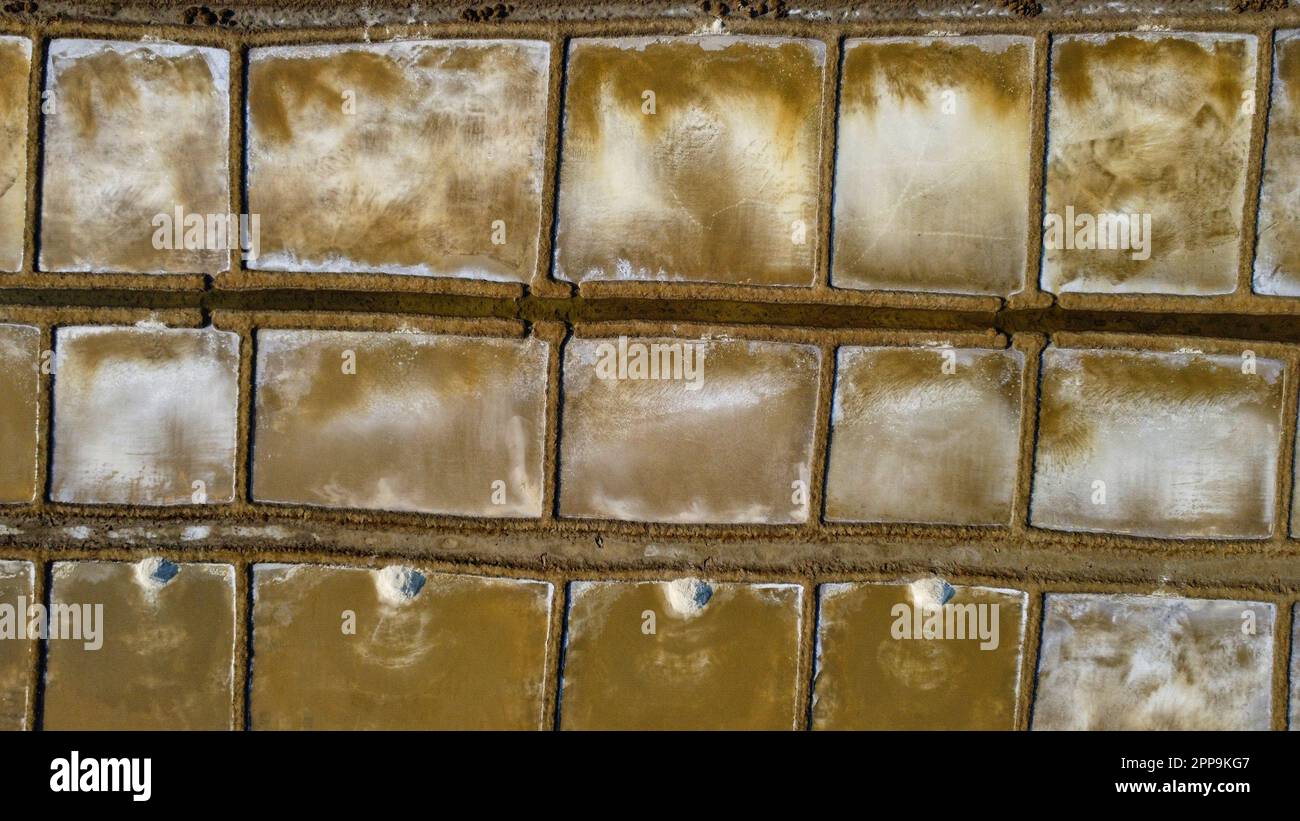 Arial drone view of salting harvesting farm in India salt production