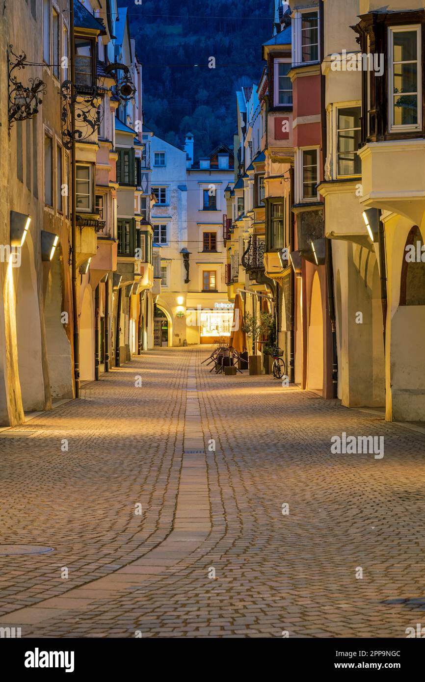 Night view of the arcades of Laubengasse street, Brixen-Bressanone, Trentino-Alto Adige/Sudtirol, Italy Stock Photo