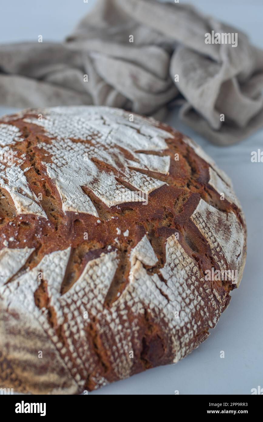 Home made whole grain bread on rustic wooden Stock Photo - Alamy
