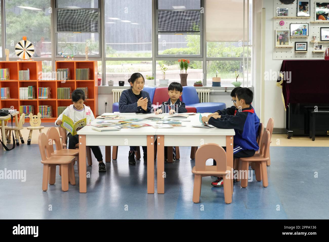 Hangzhou, China. 20th Apr, 2023. Visually impaired children read