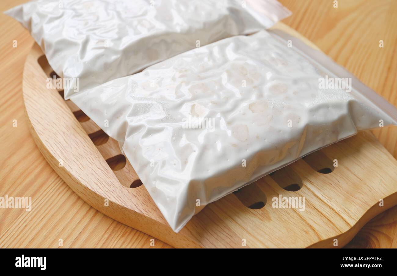Closeup of Tempeh after Soybeans Fermented in Perforated Bags Covered