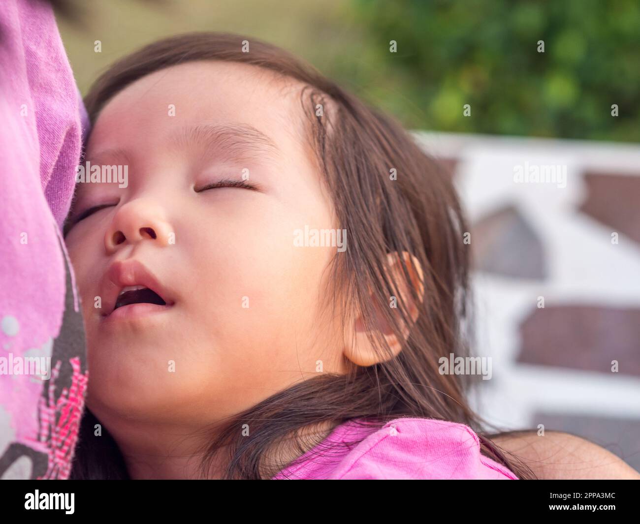 Asian baby girl sleeping with her mother Stock Photo Alamy