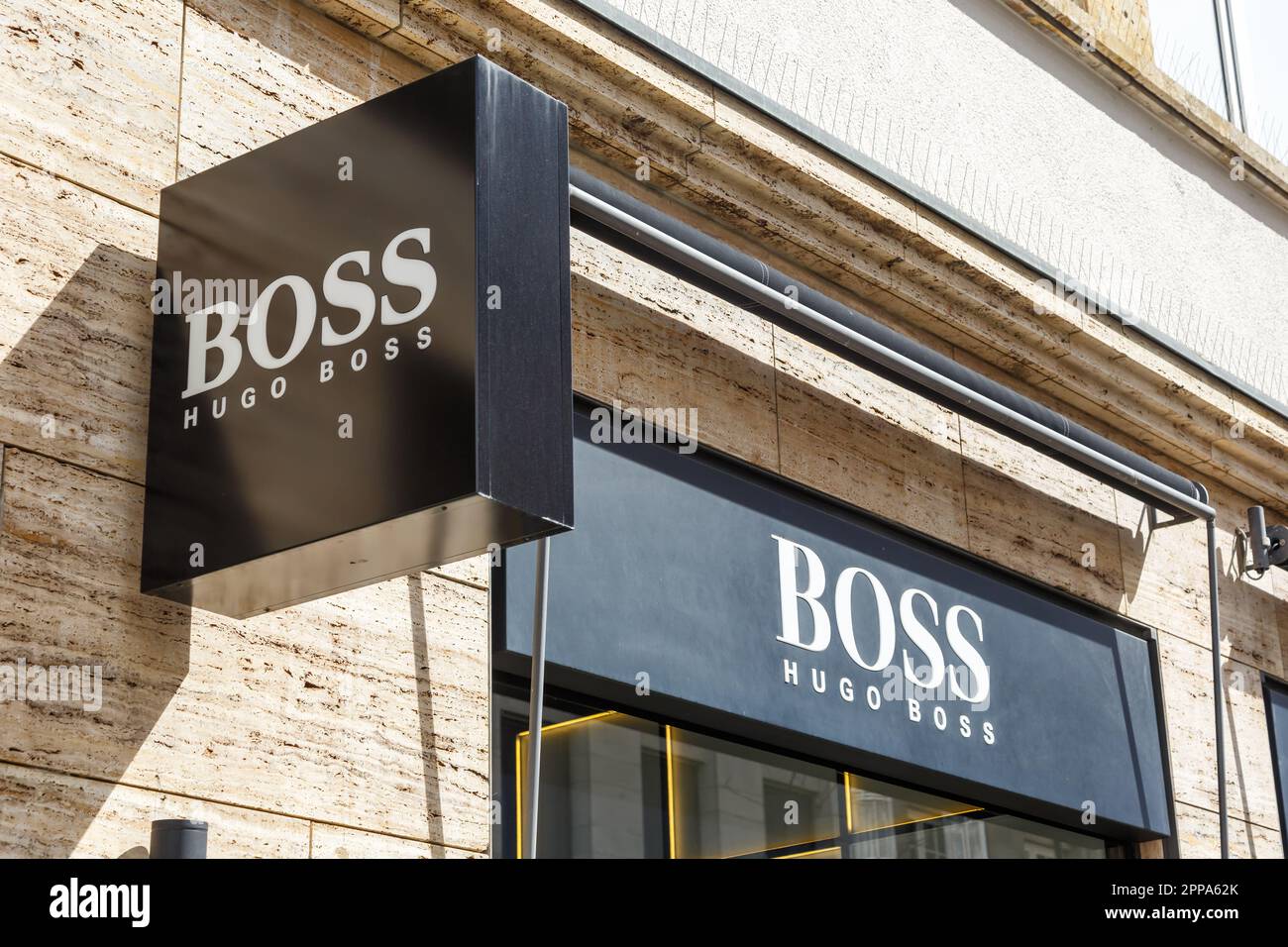 Stuttgart, Germany - April 10, 2023: Hugo Boss store brand shop with logo retail in Stuttgart, Germany. Stock Photo
