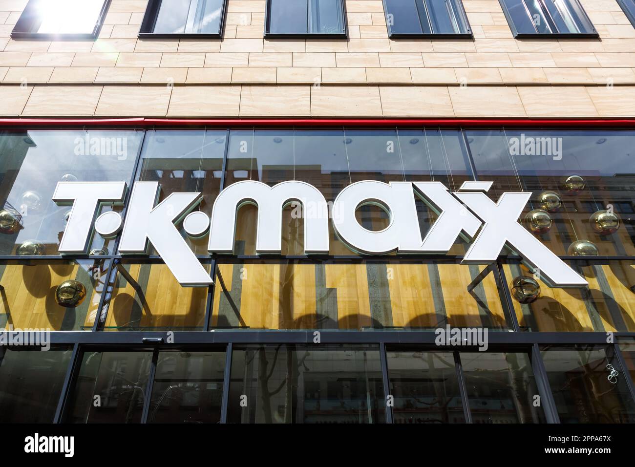 Stuttgart, Germany - April 10, 2023: TK Maxx store brand shop with logo retail in Stuttgart, Germany. Stock Photo